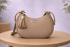 Greige Coach Hobo Bag – Leather with Tassel Accent - Nishat Creative Store